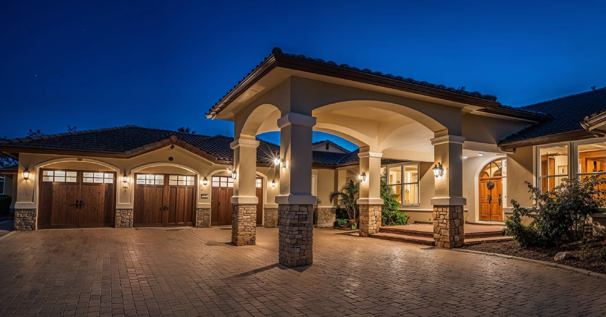 Beautiful driveway of a house at night
