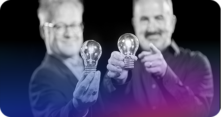 Consultant Bob & Mike both holding light bulbs