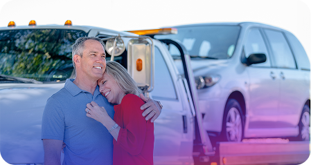 Couple hugging representing community support and charitable giving through CarsFundraising